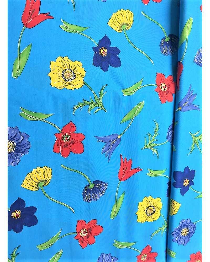 Tela estampada de algodón para tapizar flores grandes de colores base  turquesa de 280 cm alto